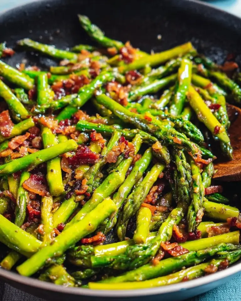 A plate of delicious bacon-wrapped asparagus spears garnished with herbs