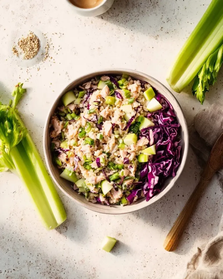 Delicious spicy tuna salad bowl garnished with vegetables and served in a bowl